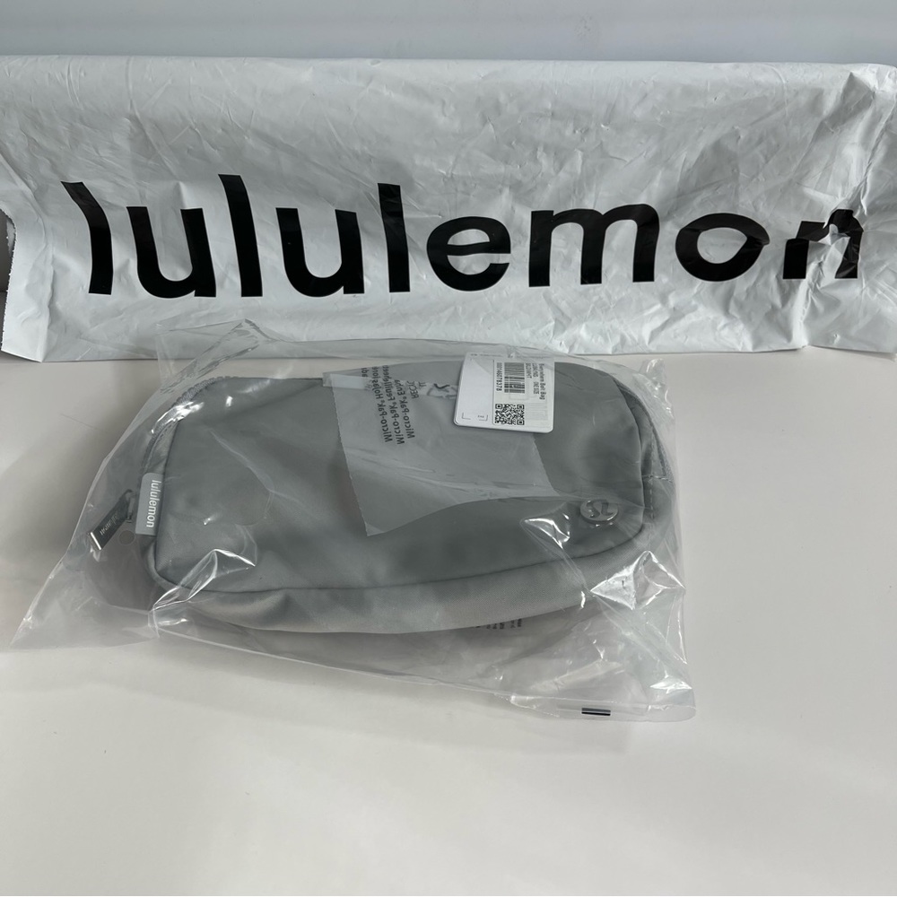 NWT Lululemon Everywhere belt bag Silver Drop with Lululemon spell out on Strap